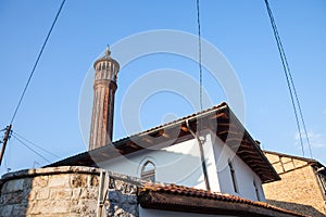 Old mosque with a wooden minaret taken in the older part of Sarajevo, capital city of Bosnia and Herzegovina.