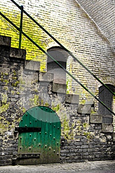 Old moss covered stairway in Alcatraz prison in San Francisco, California