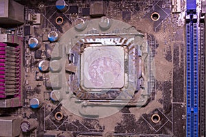 The old motherboard is dirty,broken old computer with dust covered