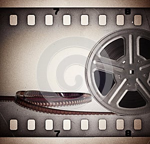 Old motion picture film reel with film strip