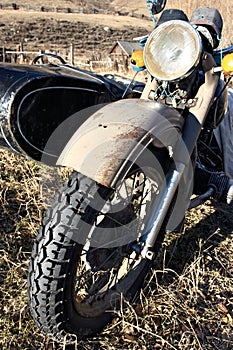 Old motocycle with buddy seat.