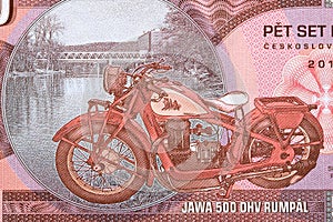 Old motorcycle Jawa 500 OHV from money photo