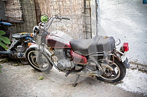 Old motorcyle on the street photo