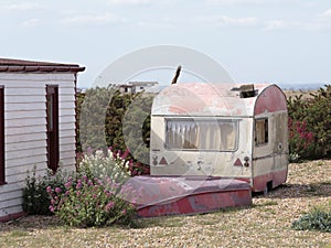 An old motorhome and boat in Dungeness