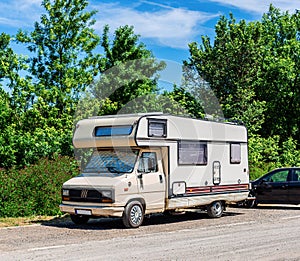 Old motorhome parked on the roadside. Hungary