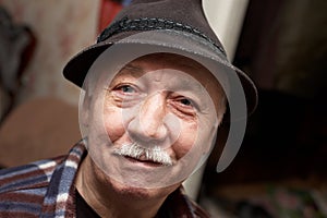Old moustached man in hat