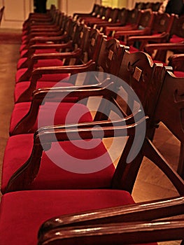 Old Movie Theatre Empty with red wooden chairs