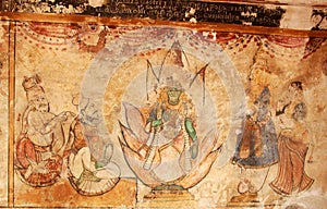 Old mural of the god kamatchi amman with devotees on a wall in the ancient Brihadisvara Temple in Thanjavur, india.