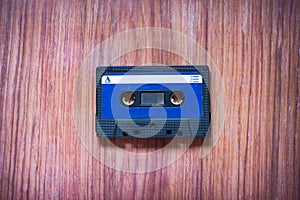 Old cassette tapes with a wooden background photo