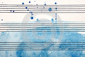 Old music sheet in blue watercolor paint. Blues music concept. Abstract blue watercolor background.