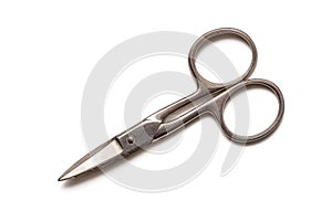 Old nail scissors isolated on white background