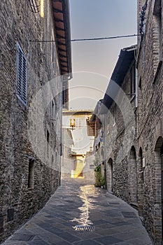 Old narrow alley in tuscan village, Tuscany, Italy