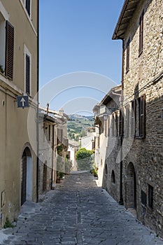 Old narrow alley in tuscan village, Tuscany, Italy