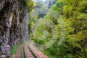 Old narrow gauge railway in mountain region
