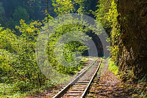 Old narrow gauge railway in mountain region