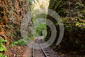 Old narrow gauge railway in mountain region