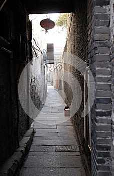 Old narrow street in Chinese water village Xitang