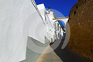 Old narrow street in european city