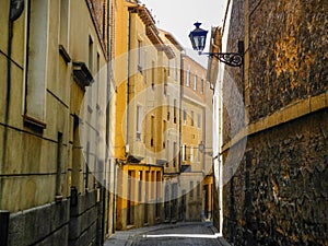 Old narrow street in Segovia, Spain