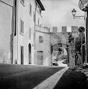 The old narrow streets in the medieval town of Massa Marittima in Tuscany shot with analogue film technique - 1