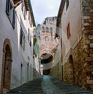 The old narrow streets in the medieval town of Massa Marittima in Tuscany shot with analogue film technique - 9