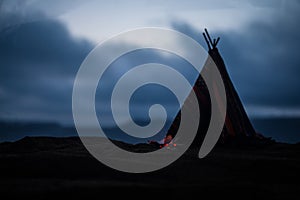 An old native american teepee in the desert