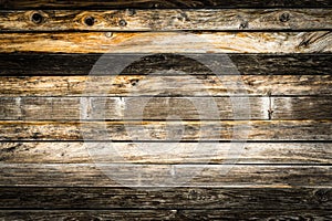 Old natural brown barn wood wall. Wooden textured background pattern.