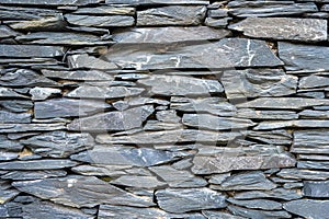 Old natural slate stone wall