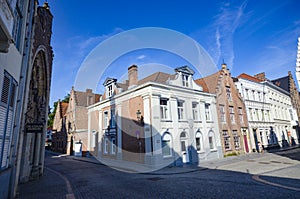 Old neat house district, Bruge, Belgium photo