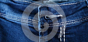 Old or new Blue jeans fashion design On brown hemp sack texture background