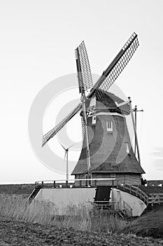 Old and new dutch windmill