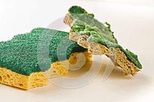 Old and new sponges for household cleaning of kitchen and bathroom