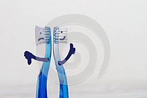 Old and new toothbrushes show the likes of the dislikes. Background