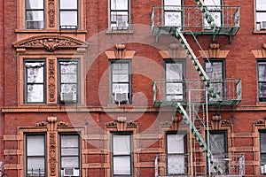 Old New York apartment building with fancy terra cotta detailing