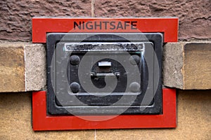 Old Night Safe on a Sandstone Wall