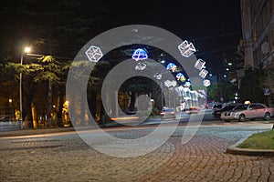 Old night street in Kutaisi, Georgia. Beautiful scene of Kutaisi in a Christmas night