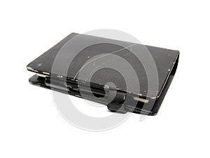 Old notebook and pen closeup on white background