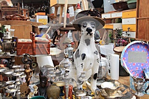 Old objects and furniture for sale at a flea market photo