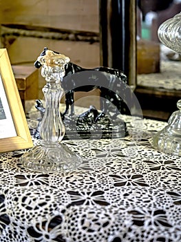 old items on an old chest of drawers in a country house photo