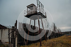 Old observation tower in abandoned Soviet Russian prison complex