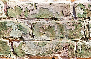 Old obsolete painted brick wall