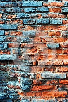 Old obsolete rusted red brick wall