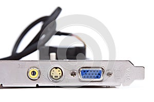 An old obsolete VGA / s-video output graphic card with archaic video outs isolated on white background. Low end pc gaming