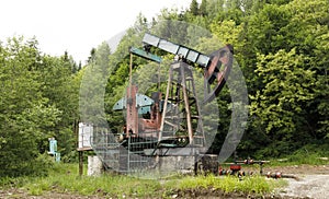 An old oil rig pollutes the environment. Mining