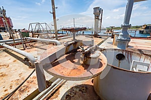 AN old oil tug in dry dock