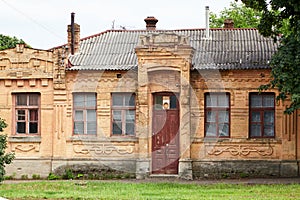 Old yellow brick house with tiled roof