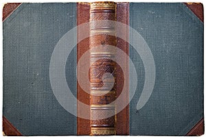 Old open book cover with embossed brown leather spine photo