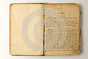 Old open book with text.