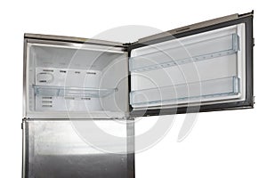 Old open stainless steel refrigerator freezer clipping path on white background