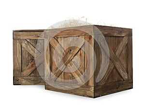 Old open wooden crates on white